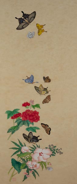 butterflies flying around a rose bush